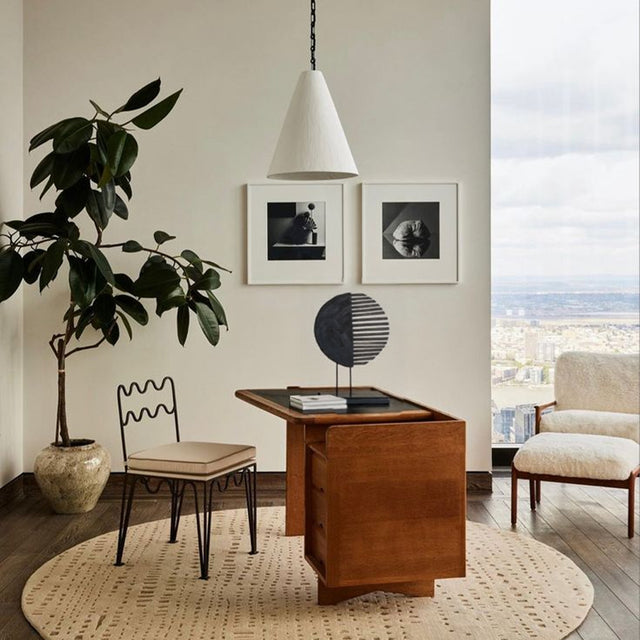 handcrafted wooden fan shaped decorative ornament on the table