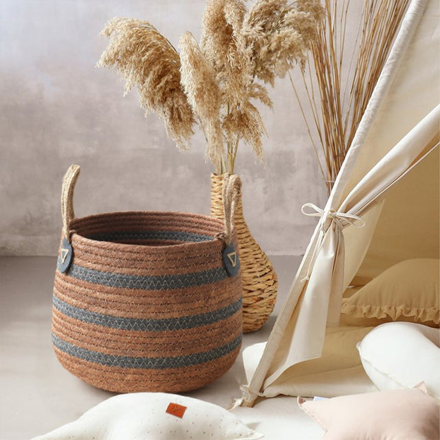 handwoven banana rope storage basket standing on the floor