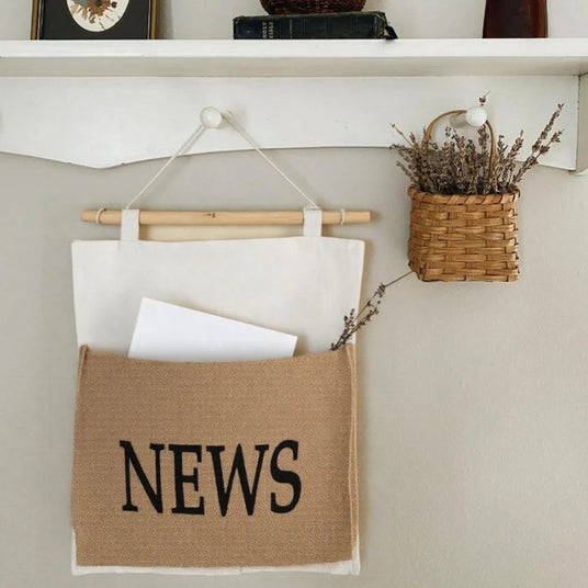 hanging storage organizer under the floating shelf