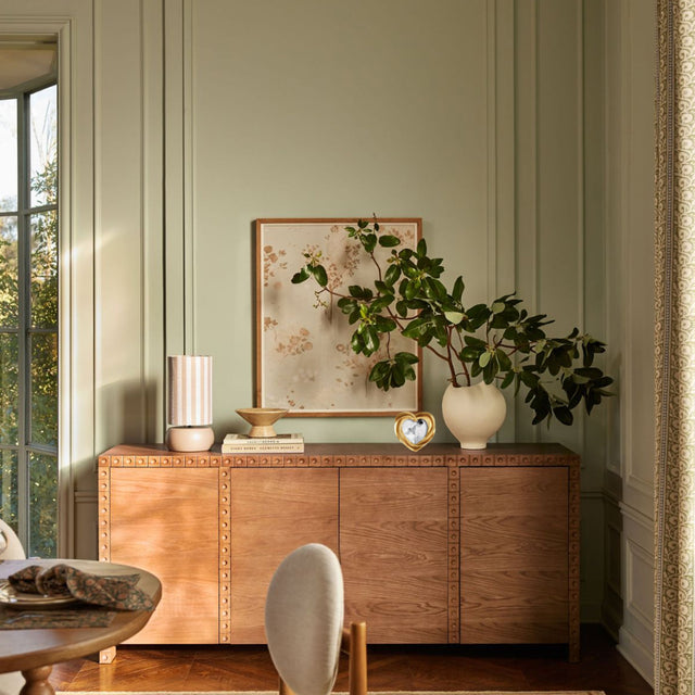 heart-shaped golden decorative picture frame in the living room