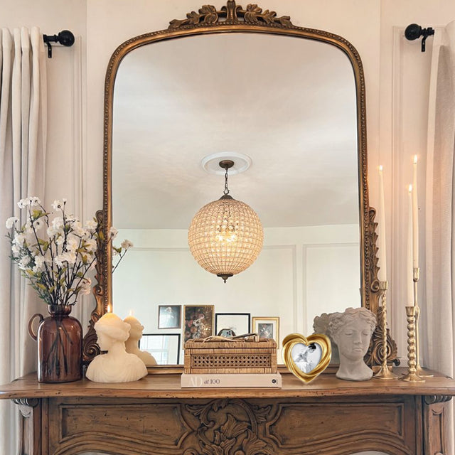 heart-shaped golden decorative picture frame on the dressing table