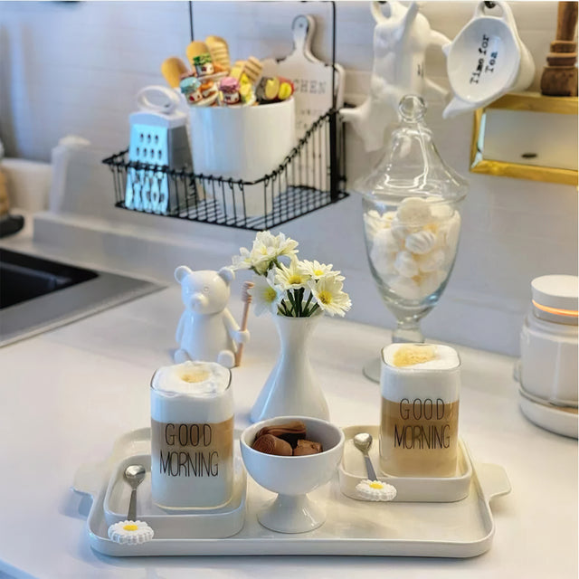 honey jar with stirring rod on the kitchen counter