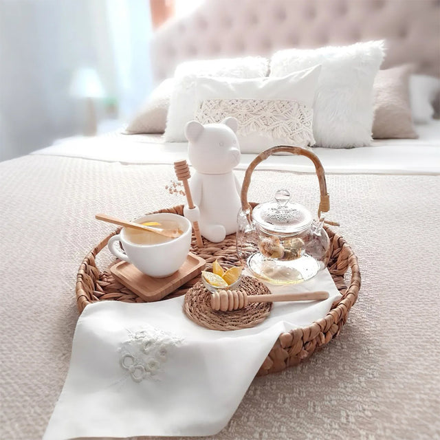 honey jar with stirring rod on the storage basket