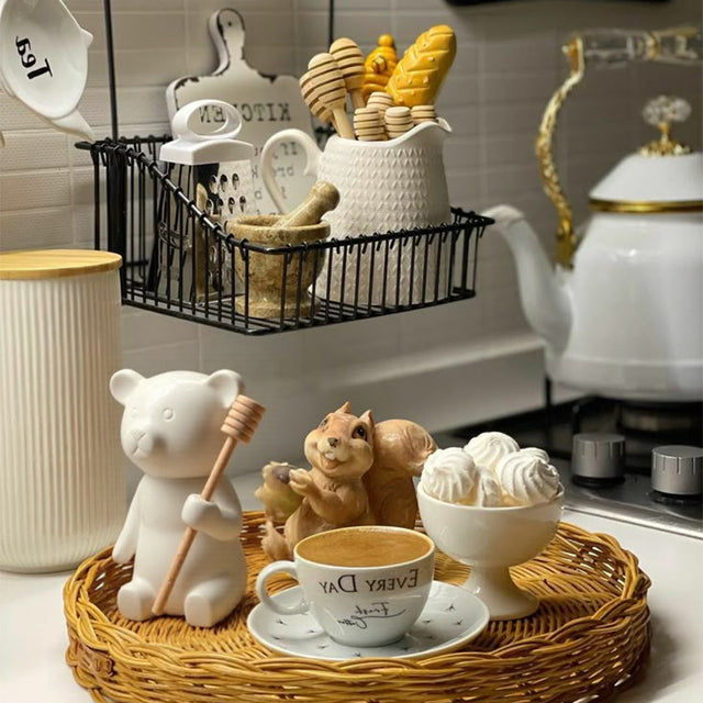 honey jar with stirring rod on the storage basket