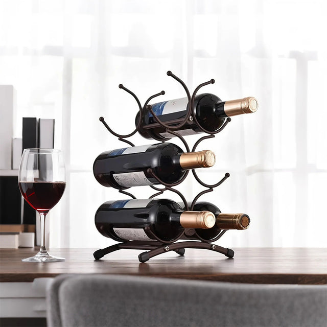 iron bronze irregular wine rack for six bottles on the table