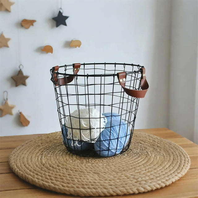 iron wire black laundry storage basket with leather handles store wool on the table