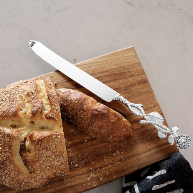 knife and cake server on the plate