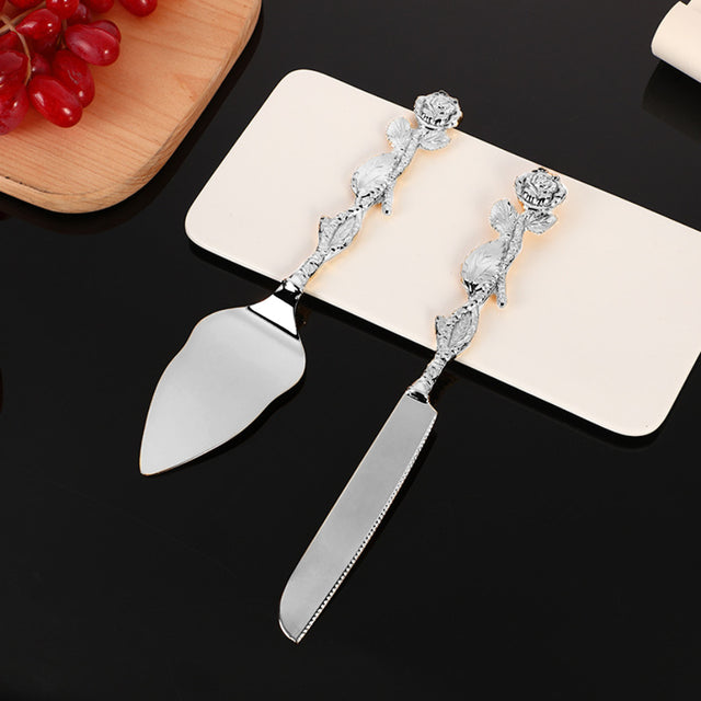 knife and cake server on the table