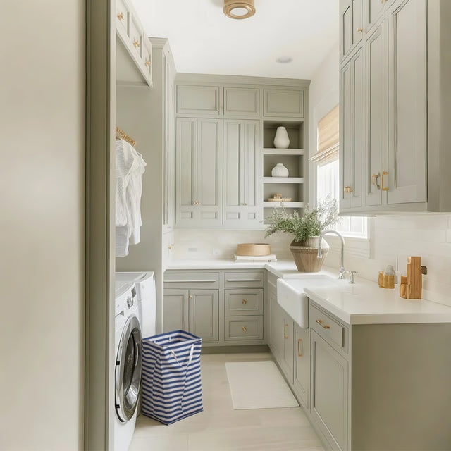 large foldable laundry basket with easy carry handles in the laundry room