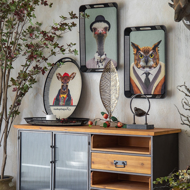 large vintage black serving tray with handles on the cabinet