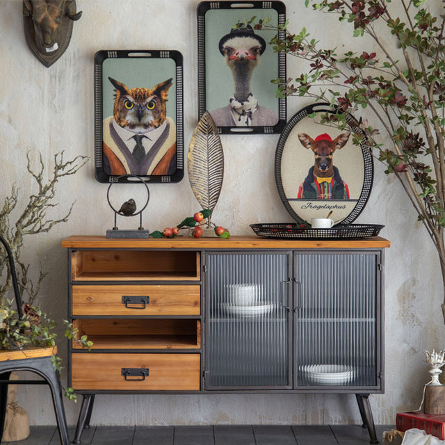 large vintage black serving tray with handles on the storage cabinet