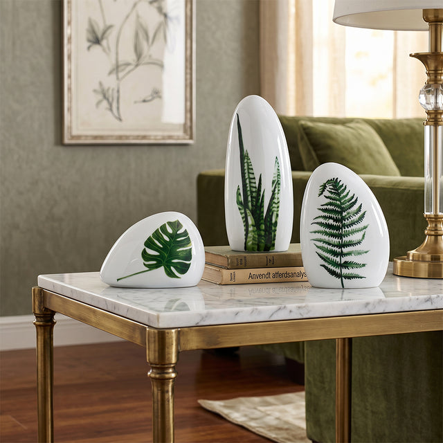leaf print ceramics on marble gold console table