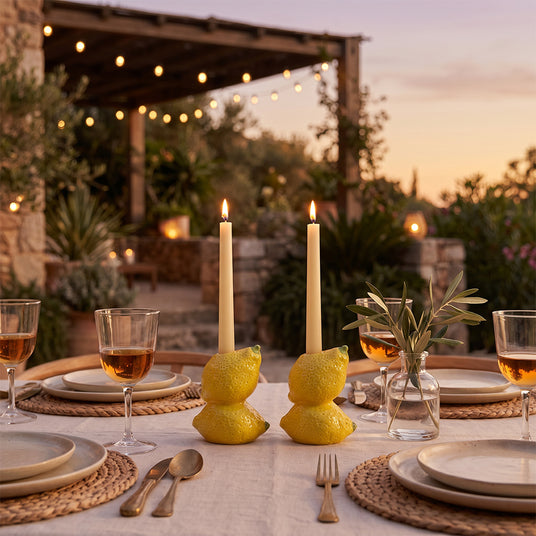 lemon candle holders on outdoor dinner table