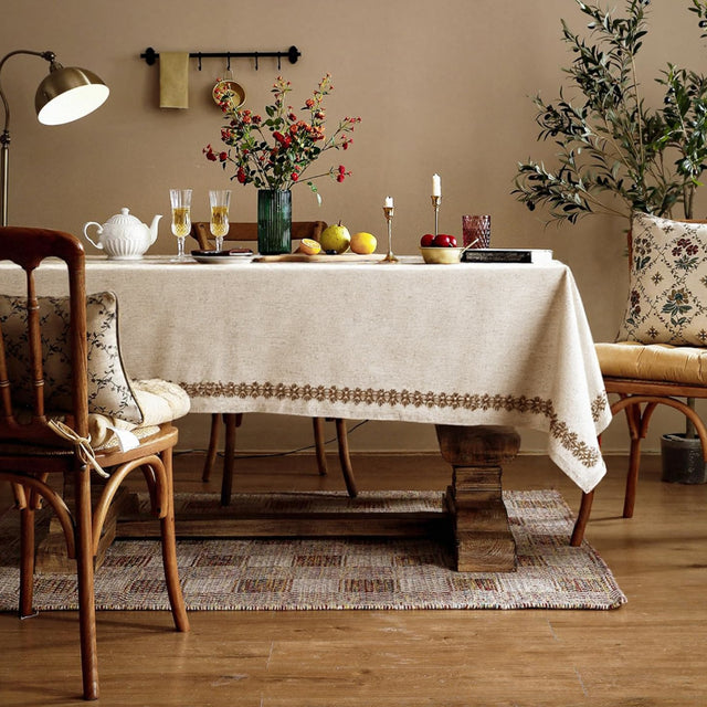linen plain khaki tablecloth with lace trimming in the dining room