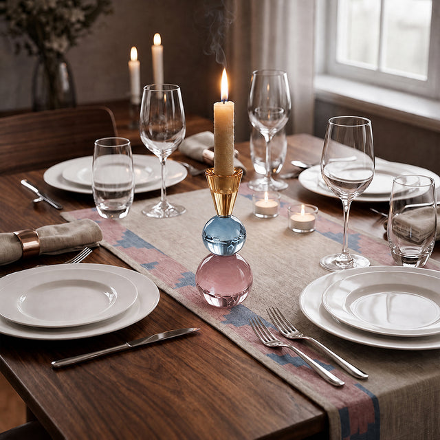 lit colorful crystal candle holder on dining table