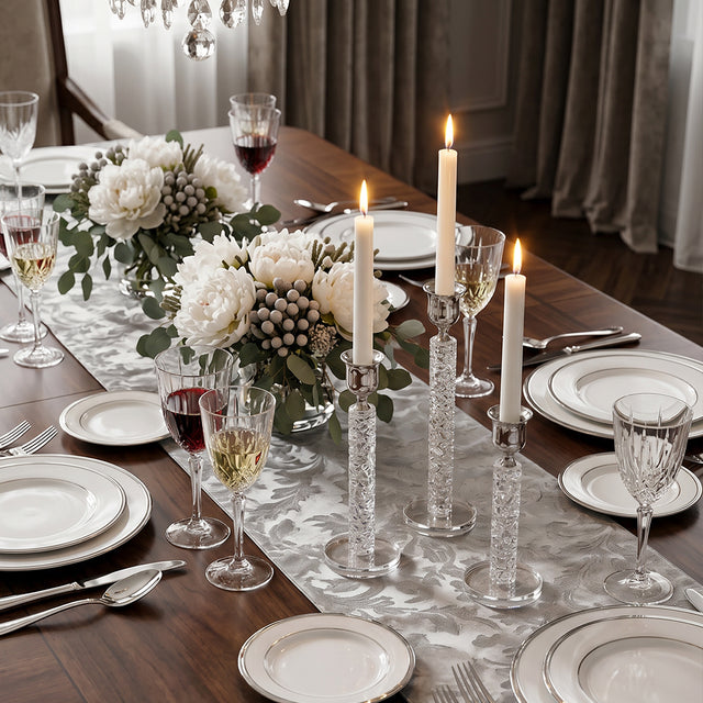lit crystal candle holders on formal dining table