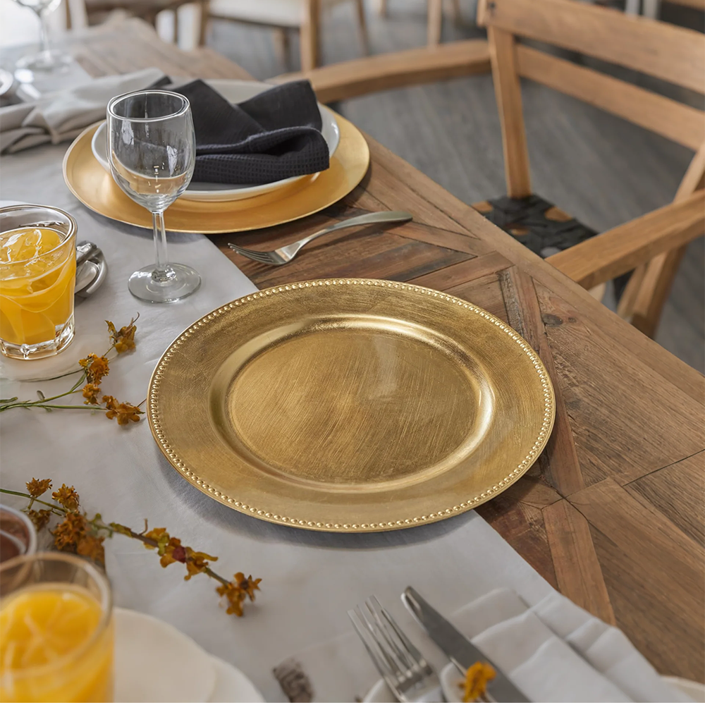 luxury gold round decorative tray on the dining table