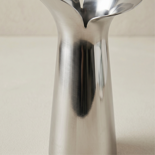 macro shot of brushed silver vase surface