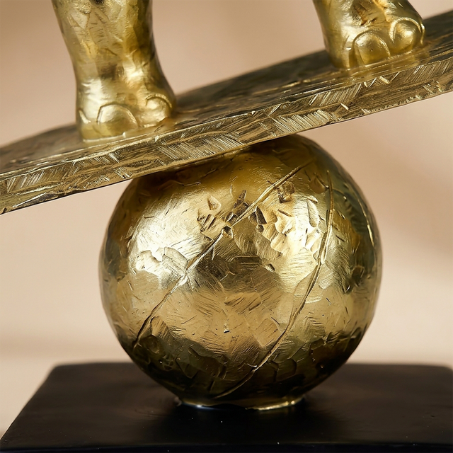 macro shot of golden balancing ball texture