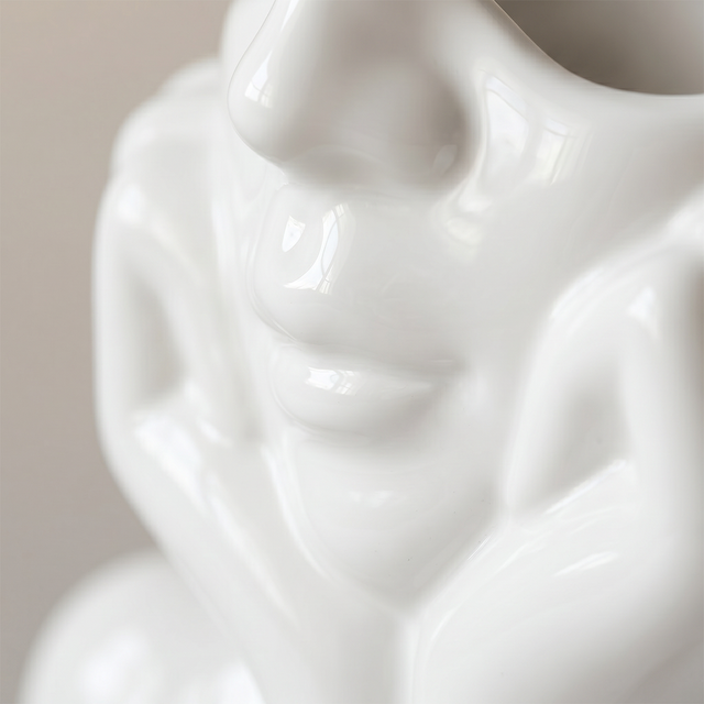 macro shot of white vase lips and nose