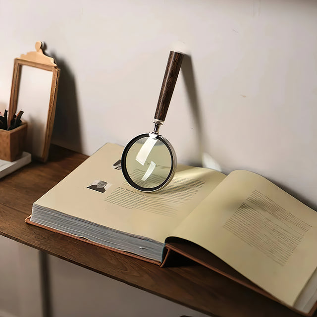 magnifying glass on the book