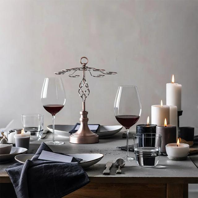 metal hanging wine glass rack on dining table