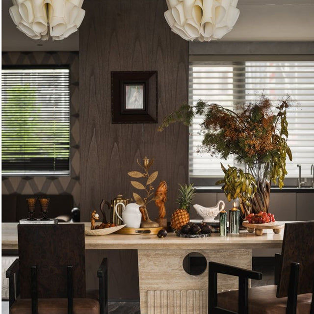 metal leaf candle holder on the table