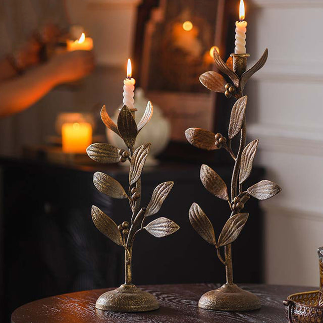 metal leaf candle holder on the table