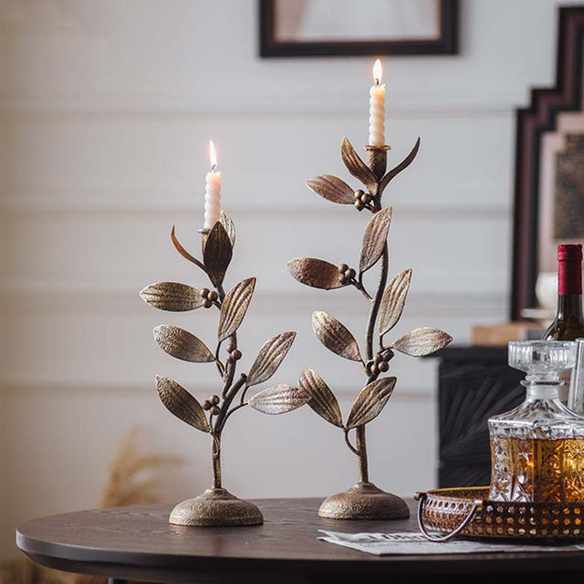 metal leaf candle holder on the table