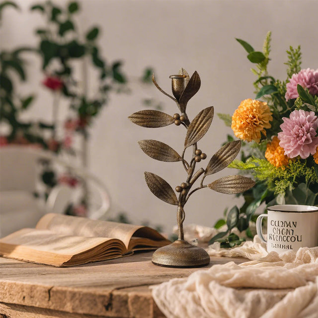 metal leaf candle holder on the table