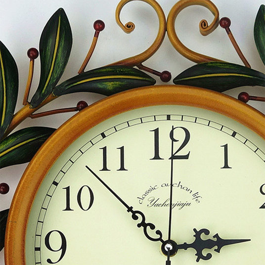 metal-olive-branch-wall-clock-details