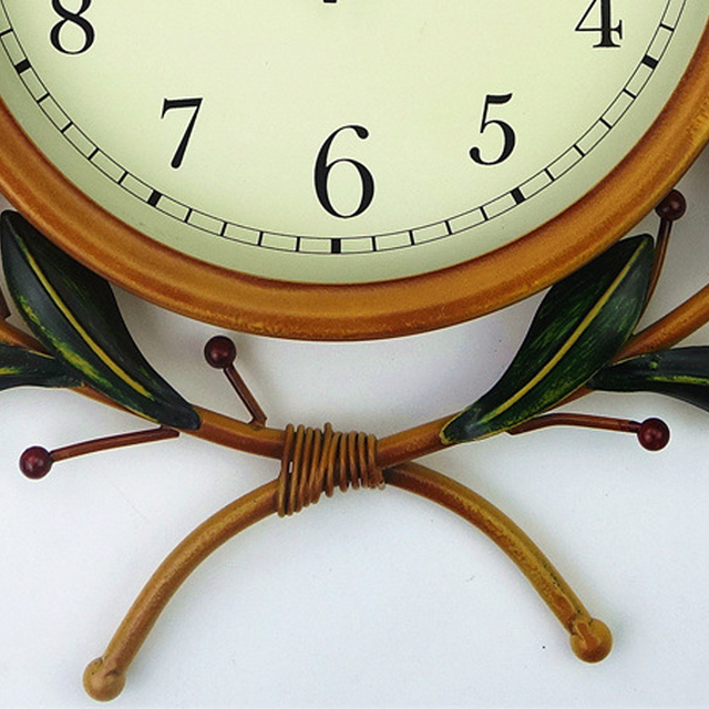 metal-olive-branch-wall-clock-details