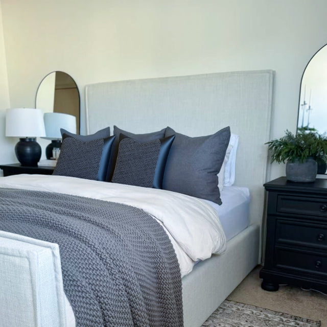 modern minimalist dark gray throw pillow in the bedroom