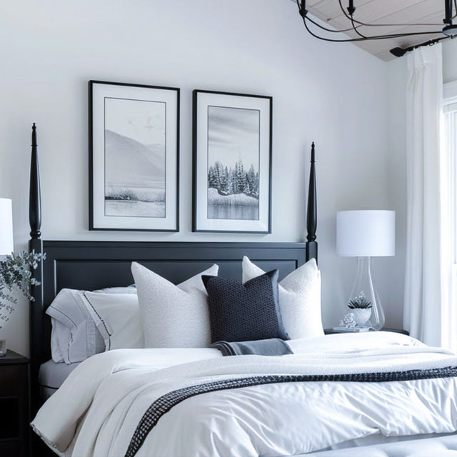 modern minimalist dark gray throw pillow on white bed