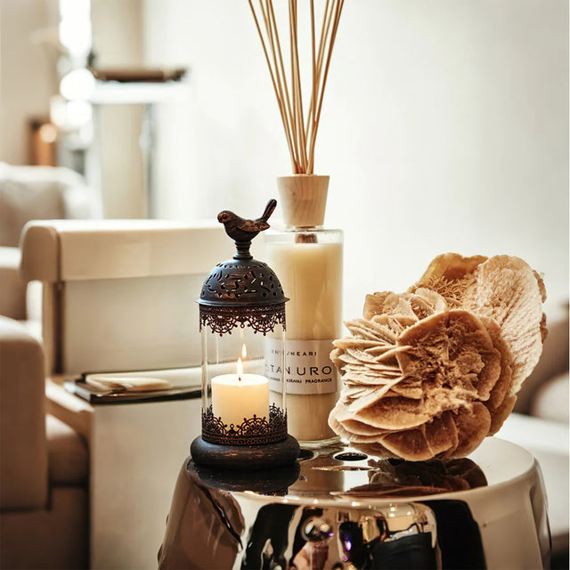 moroccan style ironwork perfumed candle holder on the side table
