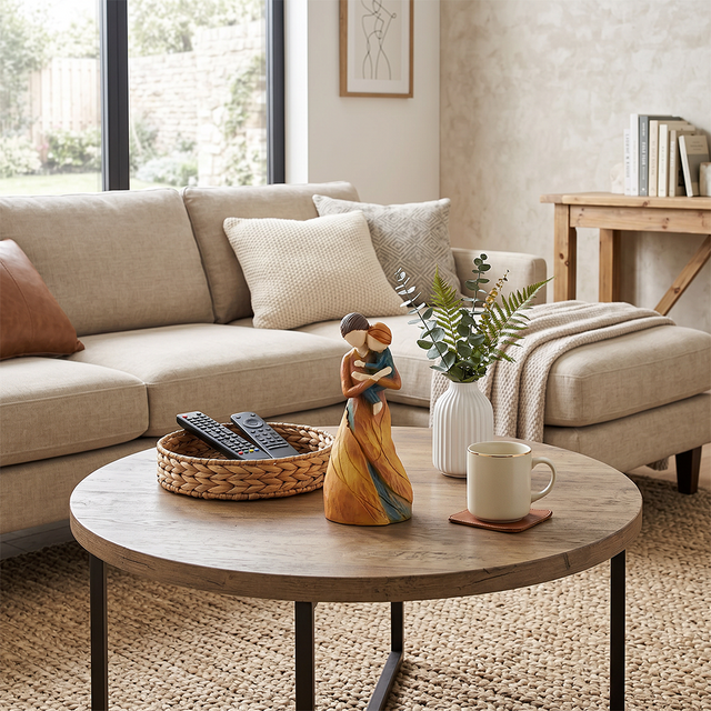 mother child figurine on living room coffee table