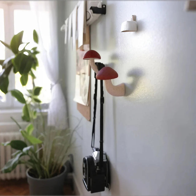 mushroom refrigerator magnet stuck on the wall