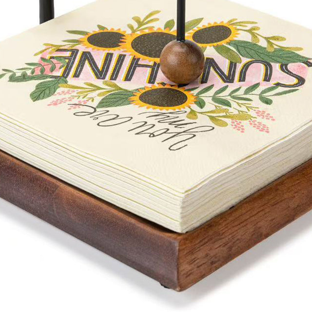 napkin-holder-with-bird-figurine-decor-close-up-0530