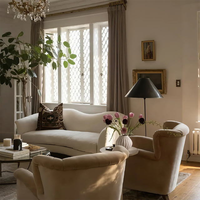 off white ceramic flower vase in the living room