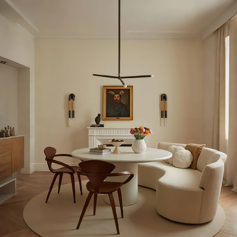 off white ceramic flower vase on the dining table