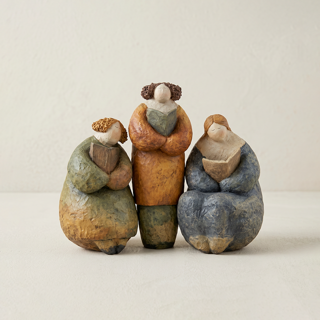 pebble figurine set on plain background