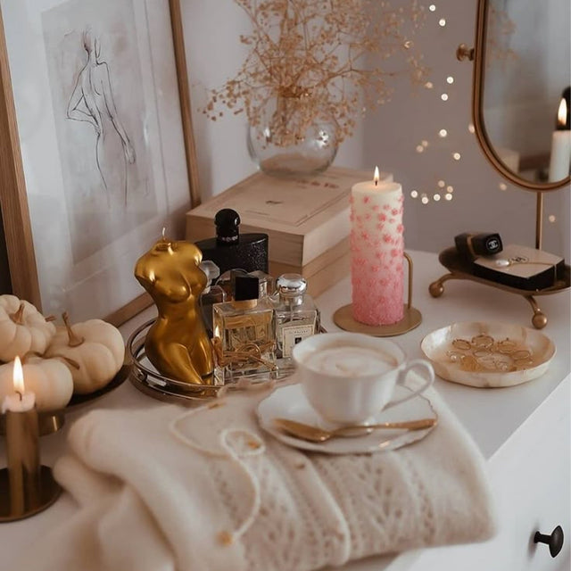 pink mold-poured candle on the desk