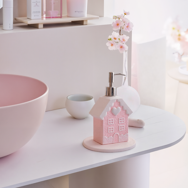 pink soap dispenser in the bathroom