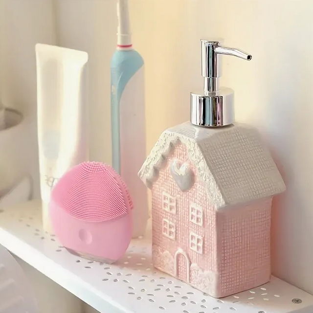 pink soap dispenser on the shelf