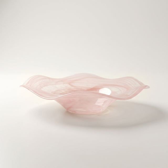 pink wavy glass bowl side view close up