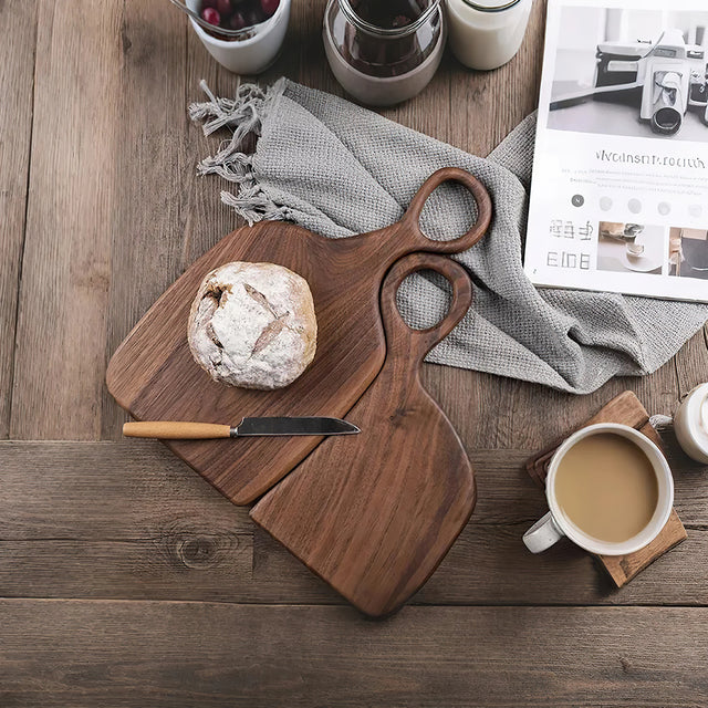 premium black walnut couple's cutting boards handling desserts