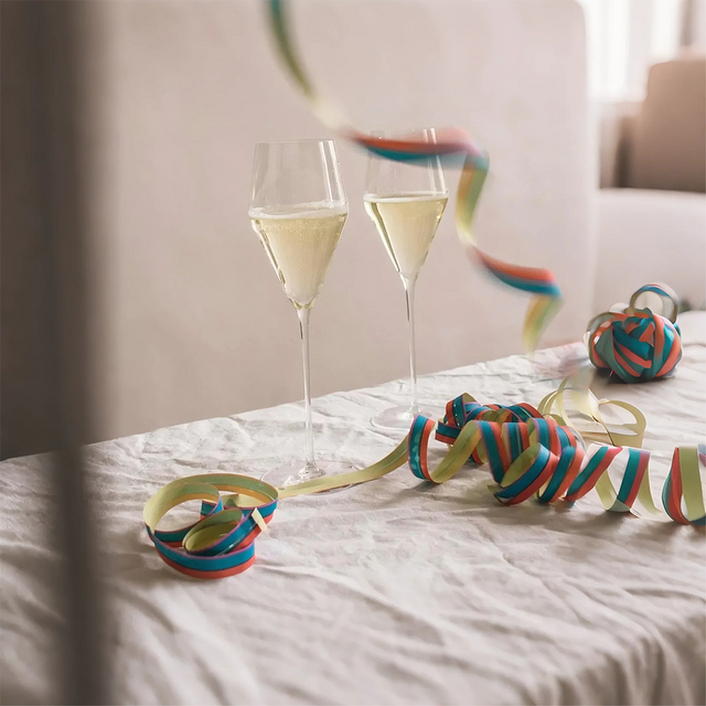 premium goblet glass filled with champagne on the table