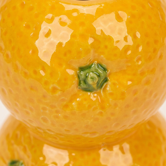 orange candle holder close up texture