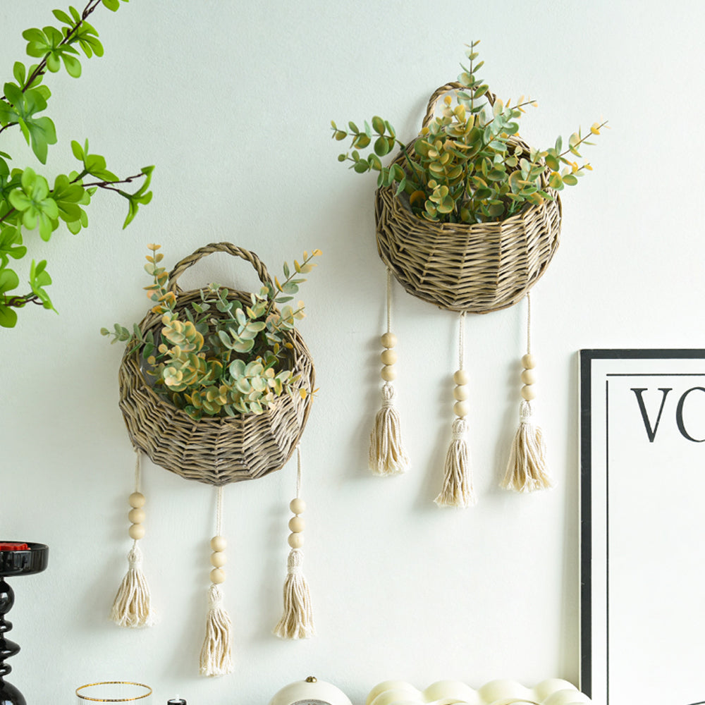rattan woven bird's nest shaped hanging basket on the wall