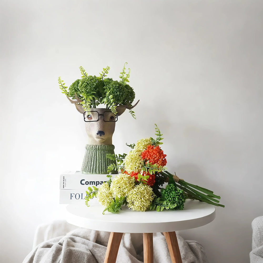 resin brown animal planter decorative vase on the side table